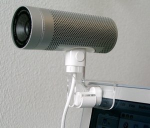 An iSight webcam mounted on a PowerBook G4.