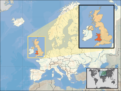 Location of Wales (orange) – in the European continent (camel & white) – in the United Kingdom (camel)