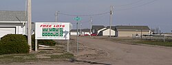 Sign promoting Kenesaw Homestead Act at subdivision entrance, March 2010