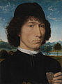 Hans Memling Portreto de viro kun romia monero