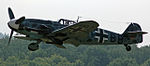 Bf 109 G-6 i tyska färger under flyguppvisning 2005 (ombyggd spansk HA-1112).