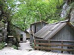 Wooden buildings in a narrow gorge