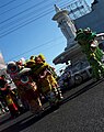 Pertunjukan barongsai di Arroyo Fountain pada hari raya Cina