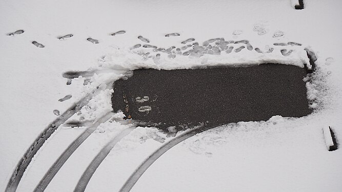 Parking lot on a snowy morning