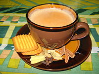 Masala chai from India with biscuits