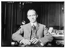 J.C. Cropsey seated at desk LCCN2014685334.jpg