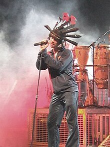 Jay Kay of Jamiroquai performs at a concert.