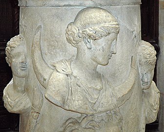 Selene from an altar piece, flanked possibly by the Dioscuri, or Phosphoros (the Morning Star) and Hesperus (the Evening Star), Louvre.[4]