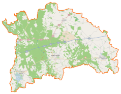 Mapa konturowa powiatu nowotomyskiego, blisko centrum u góry znajduje się punkt z opisem „Stacja Linii Radioliniowych Bolewice”