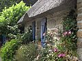 Image 18Roses, clematis, a thatched roof: a cottage garden in Brittany (from Garden design)