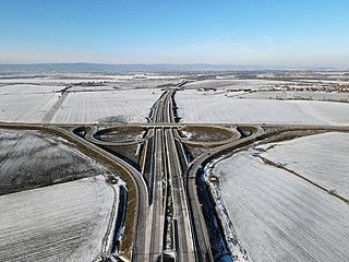 Křižování dálnice D4 s přeložkou silnice II/572