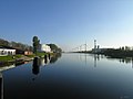 Boudewijnkanaal ter hoogte van Dudzele met binnenhaven op de achtergrond (richting Brugge)