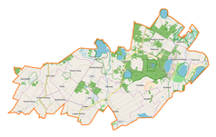 Mapa konturowa gminy Ludwin, po prawej znajduje się owalna plamka nieco zaostrzona i wystająca na lewo w swoim dolnym rogu z opisem „Piaseczno”