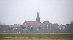 Panorama of the town in the early morning fog