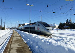 Desserte d'un TGV Lyria à destination de Paris.