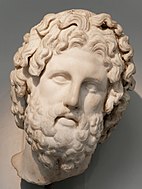 Room 22 - Colossal head of Asclepius wearing a metal crown (now lost), from a cult statue on Melos, Greece, 325–300 BC