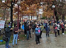 Landscape photo showing protestors demonstrating against retrenchment (lay-offs) at Indiana University of Pennsylvania