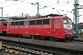 140 097 in teilweise verwitterter, orient­roter Farbgebung in Heilbronn Hbf (Oktober 2004)