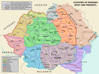 Outline showing the territory of present Romania and its into counties superimposed over the colored map of the inter-war counties.