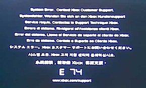 The error code E74. Above the large E 74 code is the message "System Error. Contact Xbox Customer Support." repeated in different languages.