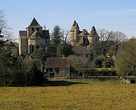 The château and church in Thégra