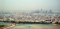 View of Muharraq with the skyline of Manama in the background (2003)