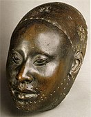 Mask for Obalufon II; circa 1300 AD; copper; height: 29.2 cm; discovered at Ife; Ife Museum of Antiquities (Ife, Nigeria)[50]