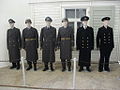 Models of Bundeswehr greatcoats from the 1960s.