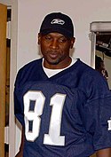 A picture of Tim Brown wearing a jersey.