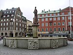 Fristadstorget. Bilden föreställer Arbetets ära och glädje från sydväst.