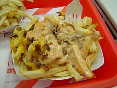 Animal fries (covered with cheese, grilled onions, and In-N-Out's secret spread) from In-N-Out Burger's secret menu