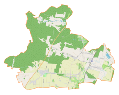 Mapa konturowa gminy Kruszyna, na dole nieco na lewo znajduje się ikonka pałacu z opisem „Pałac w Kruszynie”