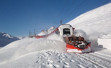 Swiss low-profile, train-mounted snowplow.