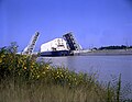 Poseidon barge transporting a Saturn V S-IC rocket from Alabama to Mississippi. The trip is 1,086.7 miles miles up the Tennessee River and then down the Mississippi River.