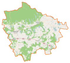 Mapa konturowa powiatu międzychodzkiego, blisko centrum na dole znajduje się punkt z opisem „Kwilcz”