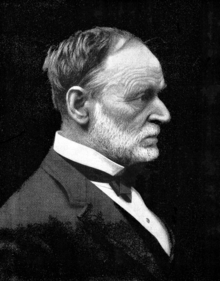 A black-and-white photogram of a man's head and shoulders. He faces the right.