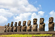 Stone statues of human heads and torsos