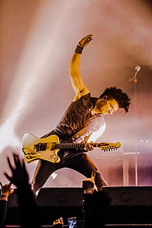 Ben Christo wielding his axe during a Sisters of Mercy Show