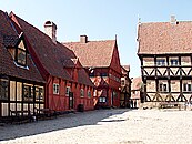 Den gamle by i Århus i Danmark fick föreställa staden i Törnrosdalen när Bröderna Lejonhjärta filmatiserades.