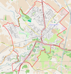 Mapa konturowa Żukowa, blisko centrum na dole znajduje się punkt z opisem „Muzeum Parafialne w Żukowie”