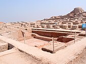 The city of Mohenjo-daro, built around 2600 BCE by the Indus valley civilization, spanning Pakistan, India and Afghanistan is one of the world's earliest cities.