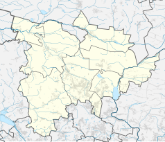 Mapa konturowa powiatu tarnogórskiego, na dole znajduje się punkt z opisem „Radzionków Rojca”