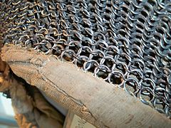 Close up detail of Mughal riveted mail hood kulah zirah, 17th century, alternating rows of round riveted rings and solid rings.