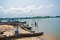 Cassava fermentation process by rural women and canoes at Oguta Lake.