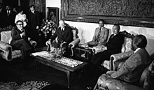 Indonesian President Suharto and Minister of foreign affairs Malik with United States President Ford sitting on chairs