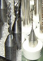 Two PCB drill bits.