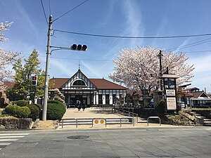 Kotohira Station surrounded by blooming cherry blossoms