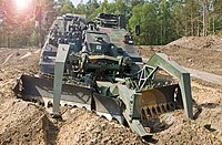 Front view of an AEV 3 Kodiak clearly showing installation of a mine plough.