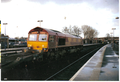 A picture of Banbury station. A EWS train powers through Banbury station