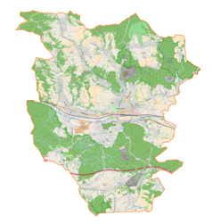 Mapa konturowa gminy Krzeszowice, blisko centrum na prawo znajduje się czarny trójkącik z opisem „Ułańskie Zdrowie”